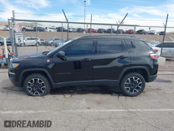 2020 Jeep Compass Trailhawk with VIN 3C4NJDDB7LT129673, listed as a IAAI auction lot 41811055 with 30,106 mi miles and . Bid and sale history available at carsss.com. Image 14.