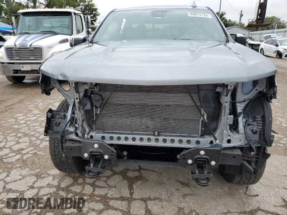 2024 Chevrolet Silverado 1500 LTZ with VIN 1GCUDGED5RZ304993, listed as a Copart auction lot 69874124 with 6,057 mi miles and Salvage Title. Bid and sale history available at DreamBid. Image 5.