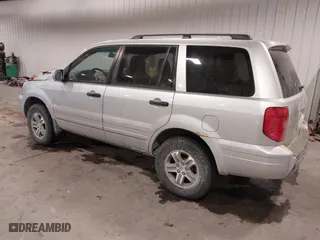 2005 Honda Pilot EX-L with VIN 2HKYF18575H557005, listed as a IAAI auction lot 41647830 with 245,992 mi miles. Bid and sale history available at carsss.com. Image 3.
