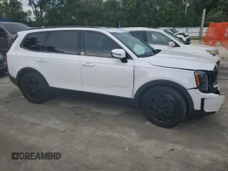 2021 Kia Telluride SX with VIN 5XYP5DHC1MG125563, listed as a Copart auction lot 61372995 with 83,358 mi miles and Salvage title. Bid and sale history available at DreamBid. Image 4.