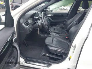 2018 BMW X1 xDrive28i with VIN WBXHT3C38J5L31322, listed as a IAAI auction lot 42260190 with 70,266 mi miles and . Bid and sale history available at DreamBid. Image 5.