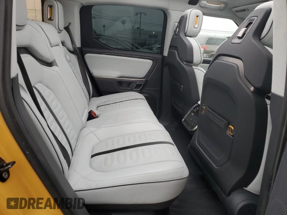 2022 Rivian R1T Launch Edition z VIN 7FCTGAAL2NN011755, wystawiony jako Copart lot #59934185 z przebiegiem 12 261 mil mil oraz Szkoda całkowita • Salvage title. Historia ofert i sprzedaży dostępna na DreamBid. Obrazek 10.