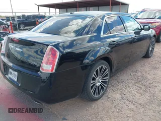 2014 Chrysler 300 S with VIN 2C3CCABG5EH205020, listed as a IAAI auction lot 42247180 with 186,458 mi miles and . Bid and sale history available at DreamBid. Image 4.