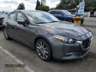 2018 Mazda 3 Touring z VIN 3MZBN1L38JM219466, wystawiony jako Copart lot #56766025 z przebiegiem 124 775 mil mil oraz Szkoda całkowita • Salvage title. Historia ofert i sprzedaży dostępna na DreamBid. Obrazek 4.