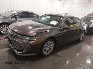 2019 Toyota Avalon Limited Hybrid z VIN 4T1B21FB3KU007114, wystawiony jako IAAI lot #41658316 z przebiegiem 127 785 mil mil oraz . Historia ofert i sprzedaży dostępna na DreamBid. Obrazek 2.
