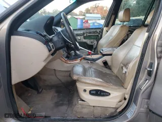 2004 BMW X5 4.4i with VIN 5UXFB53594LV02646, listed as a Copart auction lot 83036934 with 180,810 mi miles and Salvage Title. Bid and sale history available at carsss.com. Image 7.