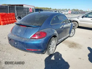 2019 Volkswagen Beetle S with VIN 3VWFD7AT7KM719095, listed as a IAAI auction lot 40919031 with 86,516 mi miles. Bid and sale history available at carsss.com. Image 4.