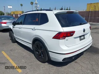 2024 Volkswagen Tiguan SE R-Line Black with VIN 3VVCB7AX7RM085619, listed as a IAAI auction lot 42325566 with 10,615 mi miles and . Bid and sale history available at DreamBid. Image 3.