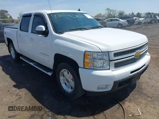 2013 Chevrolet Silverado 1500 LTZ with VIN 3GCPKTE24DG123063, listed as a IAAI auction lot 42061675 with 221,813 mi miles and . Bid and sale history available at DreamBid. Image 1.