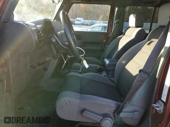 2007 Jeep Wrangler Unlimited X with VIN 1J4GB39177L124940, listed as a Copart auction lot 42505695 with 186,204 mi miles and Salvage title. Bid and sale history available at DreamBid. Image 7.