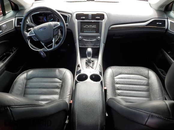2013 Ford Fusion SE Hybrid with VIN 3FA6P0LU1DR246703, listed as a Copart auction lot 58862165 with 147,543 mi miles and Clean title. Bid and sale history available at DreamBid. Image 8.