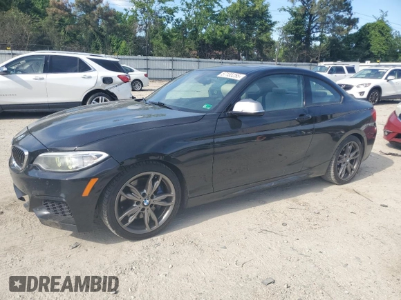 2015 BMW 2 Series M235i with VIN WBA1J7C5XFV253790, listed as a Copart auction lot 57155255 with 136,967 mi miles and Salvage title. Bid and sale history available at DreamBid. Image 1.