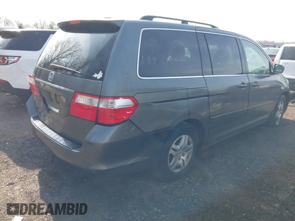 2007 Honda Odyssey EX-L z VIN 5FNRL38717B070328, wystawiony jako IAAI lot #41696829 z przebiegiem 171 229 mil mil oraz . Historia ofert i sprzedaży dostępna na DreamBid. Obrazek 4.