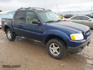 2004 Ford Explorer Sport Trac XLS with VIN 1FMZU77KX4UC21188, listed as a IAAI auction lot 41135185 with 194,607 mi miles. Bid and sale history available at carsss.com. Image 1.