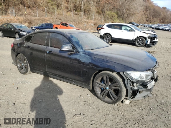 2015 BMW 4 Series 435i with VIN WBA4B1C5XFD955296, listed as a Copart auction lot 79456744 with 98,285 mi miles and Salvage Title. Bid and sale history available at DreamBid. Image 4.