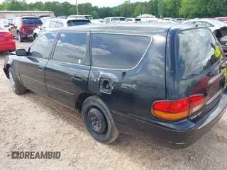 1996 Toyota Camry LE z VIN 4T1EF12K9TU117514, wystawiony jako IAAI lot #42241880 z przebiegiem 192 764 mil mil oraz . Historia ofert i sprzedaży dostępna na DreamBid. Obrazek 3.