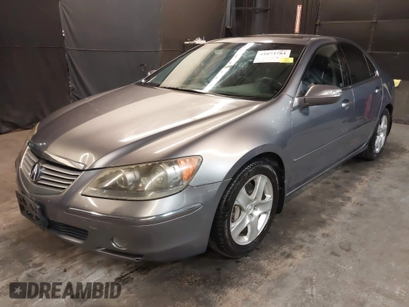 2006 Acura RL z VIN JH4KB165X6C009547, wystawiony jako IAAI lot #42073784 z przebiegiem 190 601 mil mil oraz . Historia ofert i sprzedaży dostępna na DreamBid. Obrazek 2.