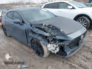 2019 Mazda Mazda3 Hatchback w/Premium Pkg with VIN JM1BPBNM0K1129087, listed as a IAAI auction lot 41684667 with 123,000 mi miles. Bid and sale history available at carsss.com. Image 1.