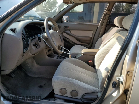 1995 Toyota Camry LE with VIN JT2GK12E7S0107467, listed as a Copart auction lot 83491534 with 112,971 mi miles and Salvage Title. Bid and sale history available at carsss.com. Image 7.