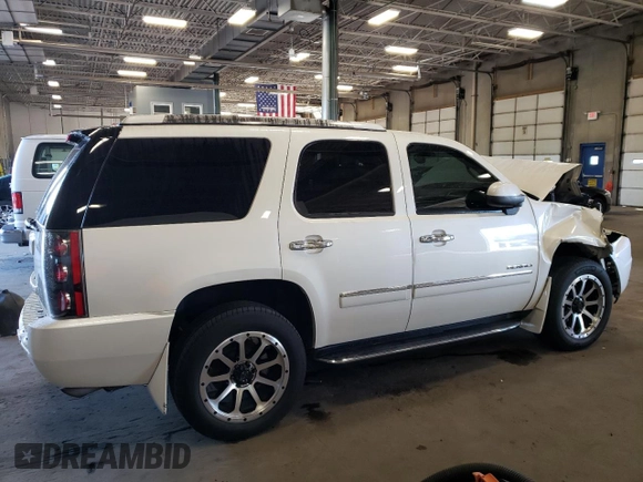 2012 GMC Yukon Denali with VIN 1GKS2EEF3CR140772, listed as a Copart auction lot 69621614 with 207,425 mi miles and Salvage Title. Bid and sale history available at carsss.com. Image 3.