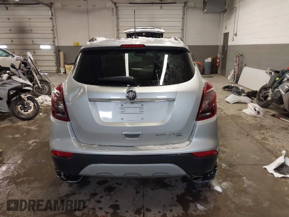 2021 Buick Encore Preferred with VIN KL4CJESB5MB308467, listed as a IAAI auction lot 41569987 with 52,199 mi miles. Bid and sale history available at carsss.com. Image 16.
