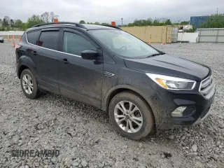 2018 Ford Escape SE z VIN 1FMCU9GD8JUA89756, wystawiony jako Copart lot #55978345 z przebiegiem 115 089 mil mil oraz Tytuł czysty. Historia ofert i sprzedaży dostępna na DreamBid. Obrazek 4.