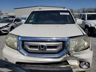 2011 Honda Pilot Touring z VIN 5FNYF3H9XBB044579, wystawiony jako Copart lot #50303125 z przebiegiem 227 482 mil mil oraz Szkoda całkowita • Salvage title. Historia ofert i sprzedaży dostępna na DreamBid. Obrazek 5.