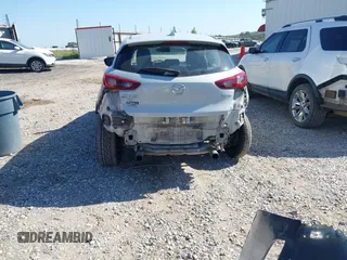 2018 Mazda CX-3 Touring z VIN JM1DKFC77J0331828, wystawiony jako IAAI lot #40482555 z przebiegiem 101 473 mil mil oraz . Historia ofert i sprzedaży dostępna na DreamBid. Obrazek 6.