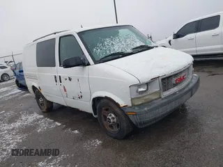 2003 GMC Safari z VIN 1GTDL19X63B512806, wystawiony jako IAAI lot #41664253 z przebiegiem Nie podano mil oraz . Historia ofert i sprzedaży dostępna na DreamBid. Obrazek 1.