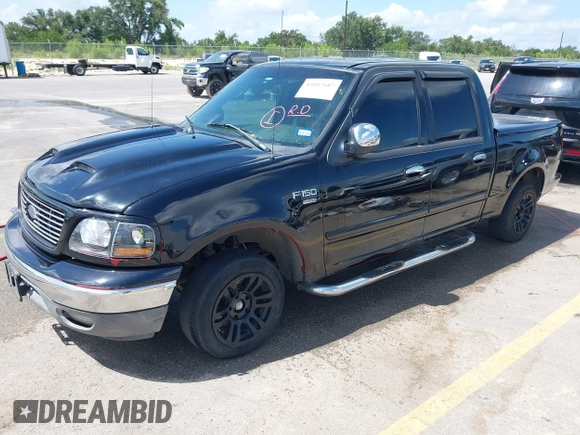 2003 Ford F-150 XLT with VIN 1FTRW07673KD87283, listed as a IAAI auction lot 42687687 with 339,160 mi miles and . Bid and sale history available at DreamBid. Image 2.