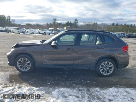 2014 BMW X1 xDrive28i with VIN WBAVL1C56EVY19340, listed as a IAAI auction lot 41340436 with 85,867 mi miles. Bid and sale history available at carsss.com. Image 14.