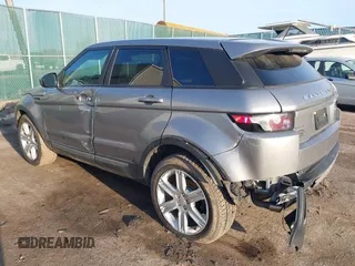 2014 Land Rover Range Rover Evoque Pure Plus z VIN SALVP2BG0EH863440, wystawiony jako IAAI lot #41760065 z przebiegiem 136 997 mil mil oraz . Historia ofert i sprzedaży dostępna na DreamBid. Obrazek 3.
