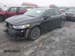 2018 Ford Fusion Titanium with VIN 3FA6P0RU7JR182119, listed as a IAAI auction lot 41984816 with 146,748 mi miles and . Bid and sale history available at DreamBid. Image 2.