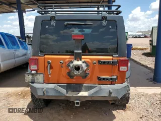 2011 Jeep Wrangler Unlimited Rubicon with VIN 1J4BA6H13BL538385, listed as a Copart auction lot 64080075 with 90,459 mi miles and Salvage title. Bid and sale history available at DreamBid. Image 6.