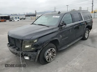 2019 Chevrolet Suburban LT z VIN 1GNSCHKCXKR143548, wystawiony jako Copart lot #54251715 z przebiegiem 102 804 mil mil oraz Szkoda całkowita • Salvage title. Historia ofert i sprzedaży dostępna na DreamBid. Obrazek 1.