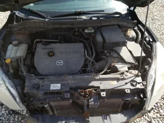 2013 Mazda 3 i SV z VIN JM1BL1TG4D1796203, wystawiony jako Copart lot #56365825 z przebiegiem 190 717 mil mil oraz Szkoda całkowita • Salvage title. Historia ofert i sprzedaży dostępna na DreamBid. Obrazek 11.
