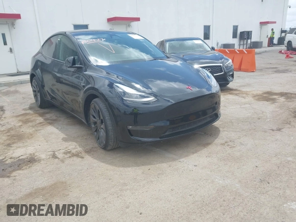 2023 Tesla Model Y Performance with VIN 7SAYGDEF4PF809308, listed as a IAAI auction lot 42056769 with 12,101 mi miles and . Bid and sale history available at DreamBid. Image 1.