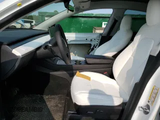 2022 Tesla Model Y Long Range z VIN 7SAYGDEE5NF355624, wystawiony jako Copart lot #58058465 z przebiegiem 33 784 mil mil oraz Szkoda całkowita • Salvage title. Historia ofert i sprzedaży dostępna na DreamBid. Obrazek 7.