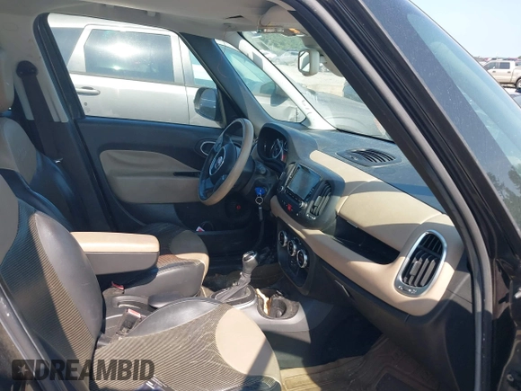 2014 FIAT 500L Lounge with VIN ZFBCFACHXEZ005568, listed as a IAAI auction lot 42802980 with 130,508 mi miles and . Bid and sale history available at DreamBid. Image 5.