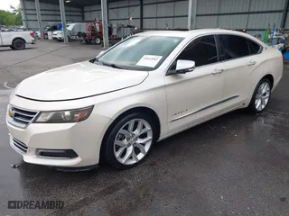 2014 Chevrolet Impala LTZ with VIN 1G1155S38EU105260, listed as a IAAI auction lot 42012082 with 230,407 mi miles. Bid and sale history available at carsss.com. Image 2.