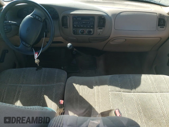 1997 Ford F-150 with VIN 2FTDF1828VCA45652, listed as a Copart auction lot 51111554 with 181,866 mi miles and Clean title. Bid and sale history available at DreamBid. Image 8.