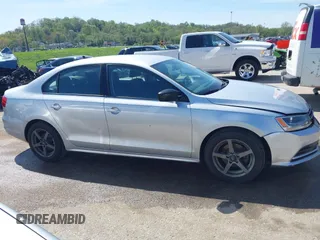 2015 Volkswagen Jetta Sedan 2.0L S with VIN 3VW2K7AJXFM423061, listed as a IAAI auction lot 42083522 with 161,028 mi miles. Bid and sale history available at carsss.com. Image 13.