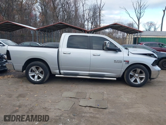 2014 Ram 1500 Big Horn with VIN 1C6RR7LM1ES370977, listed as a IAAI auction lot 41037510 with 145,692 mi miles and . Bid and sale history available at DreamBid. Image 13.