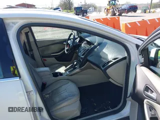 2012 Ford Focus SEL with VIN 1FAHP3M21CL413436, listed as a IAAI auction lot 42011706 with 392,754 mi miles. Bid and sale history available at carsss.com. Image 5.