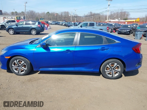 2017 Honda Civic LX z VIN 19XFC2F54HE203525, wystawiony jako IAAI lot #41796081 z przebiegiem 82 910 mil mil oraz . Historia ofert i sprzedaży dostępna na DreamBid. Obrazek 14.