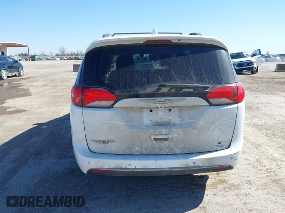 2018 Chrysler Pacifica Touring L with VIN 2C4RC1BG1JR119682, listed as a IAAI auction lot 41762362 with 167,380 mi miles and . Bid and sale history available at DreamBid. Image 16.