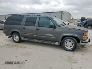 1999 Chevrolet Suburban with VIN 1GBEC16R0XJ434453, listed as a Copart auction lot 54711725 with 179,597 mi miles and Clean title. Bid and sale history available at DreamBid. Image 4.