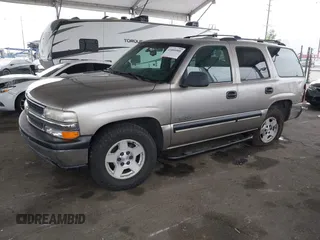 2002 Chevrolet Tahoe LS with VIN 1GNEC13T62R311933, listed as a IAAI auction lot 41895509 with 236,603 mi miles and . Bid and sale history available at DreamBid. Image 2.