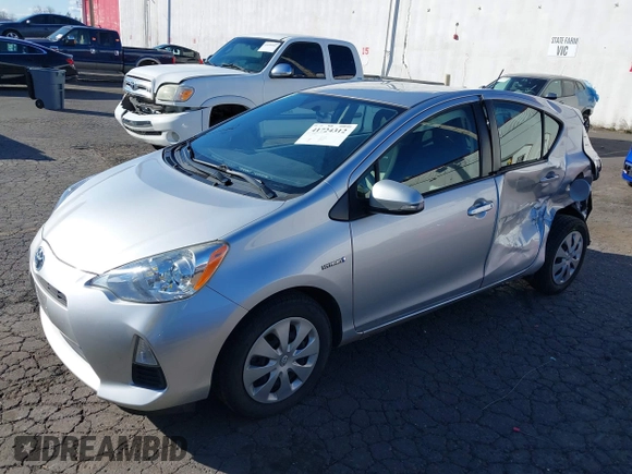 2014 Toyota Prius One z VIN JTDKDTB32E1574607, wystawiony jako IAAI lot #41724312 z przebiegiem 102 612 mil mil oraz . Historia ofert i sprzedaży dostępna na DreamBid. Obrazek 17.