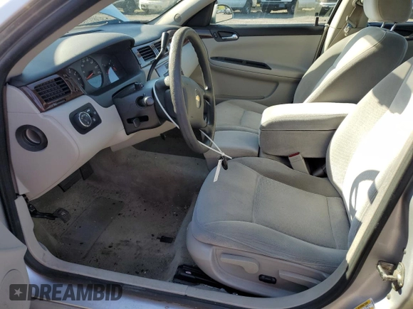 2010 Chevrolet Impala LS with VIN 2G1WA5EN8A1201930, listed as a Copart auction lot 52489895 with 105,302 mi miles and Salvage Title. Bid and sale history available at DreamBid. Image 7.
